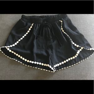 Embroidered black shorts